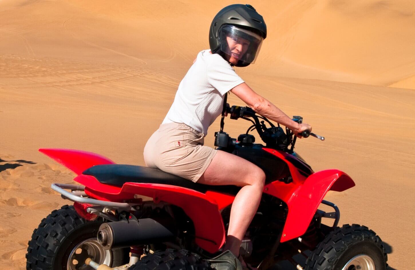 a-wonderful-shot-of-a-visitor-in-the-pyramids-area-while-riding-a-quad-bike