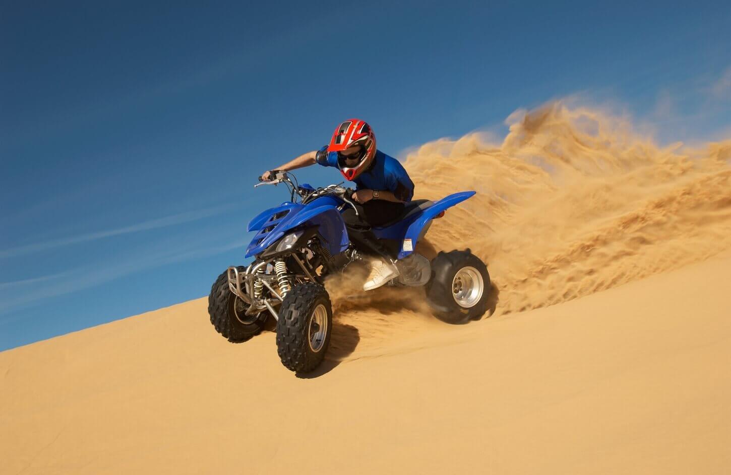 a-wonderful-shot-of-one-of-our-visitors-in-the-pyramids-while-riding-a-quad-bike